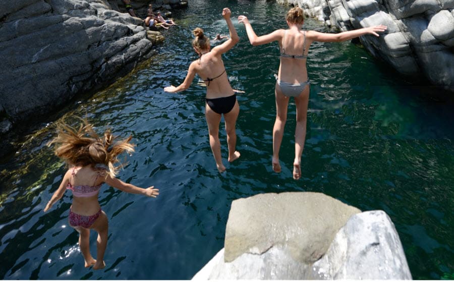 girls-jumping-in-water